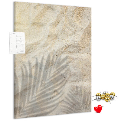 Tablero de corcho para pared con diseño de arena del desierto y la delicada sombra de una hoja