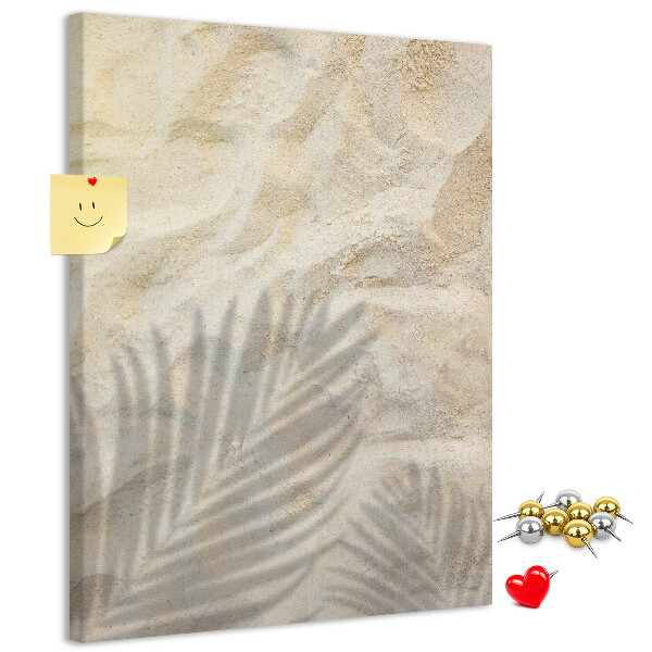 Tablero de corcho para pared con diseño de arena del desierto y la delicada sombra de una hoja
