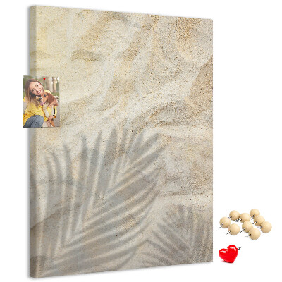 Tablero de corcho para pared con diseño de arena del desierto y la delicada sombra de una hoja