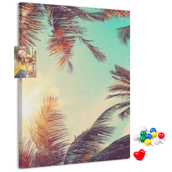 Tablero de corcho para pared diseño de hojas de palmera tropical bajo el sol poniente