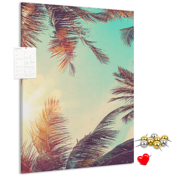 Tablero de corcho para pared diseño de hojas de palmera tropical bajo el sol poniente