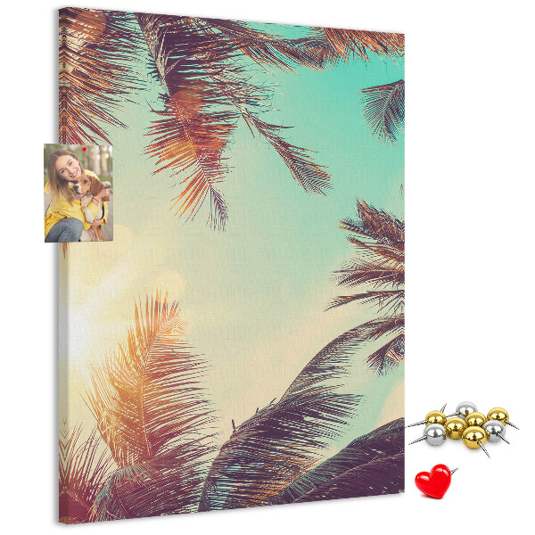 Tablero de corcho para pared diseño de hojas de palmera tropical bajo el sol poniente