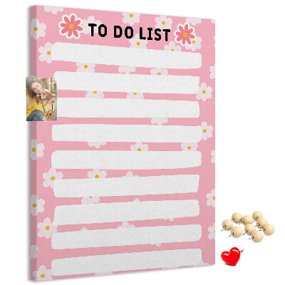 Pizarra de corcho decorativa con estampado floral sobre fondo rosa