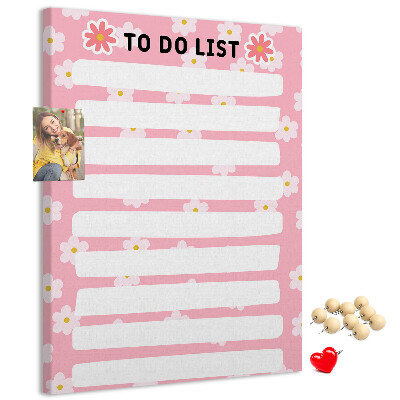 Pizarra de corcho decorativa con estampado floral sobre fondo rosa
