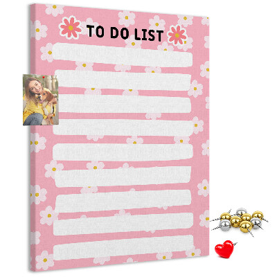Pizarra de corcho decorativa con estampado floral sobre fondo rosa