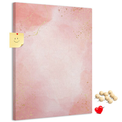 Tablero de corcho con un delicado fondo rosa y detalles dorados