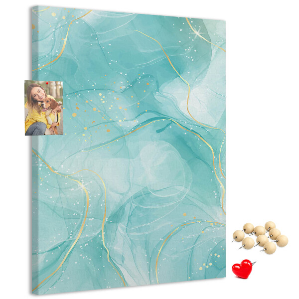 Pizarra de corcho decorativa con diseño de delicadas olas azules y detalles dorados