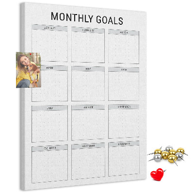 Tablero de corcho Planificar los objetivos mensuales en el calendario.