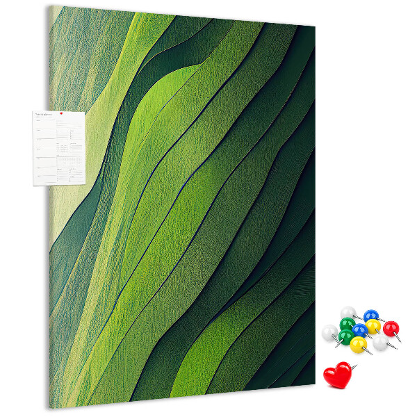 Pizarra de corcho decorativa con diseño de ondas de hojas verdes en tonos sutiles