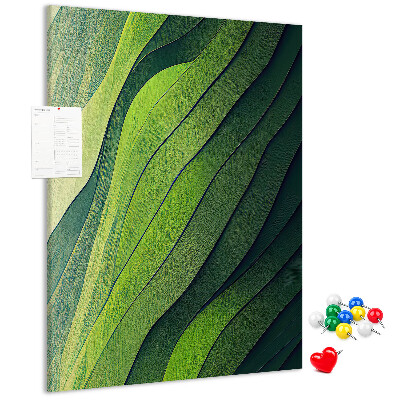 Pizarra de corcho decorativa con diseño de ondas de hojas verdes en tonos sutiles