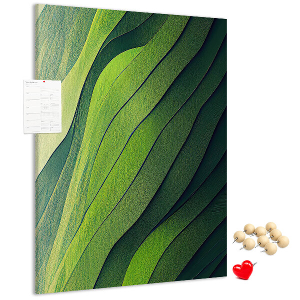 Pizarra de corcho decorativa con diseño de ondas de hojas verdes en tonos sutiles