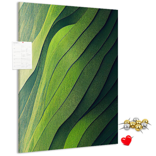 Pizarra de corcho decorativa con diseño de ondas de hojas verdes en tonos sutiles