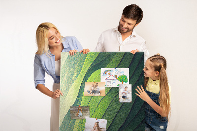 Pizarra de corcho decorativa con diseño de ondas de hojas verdes en tonos sutiles