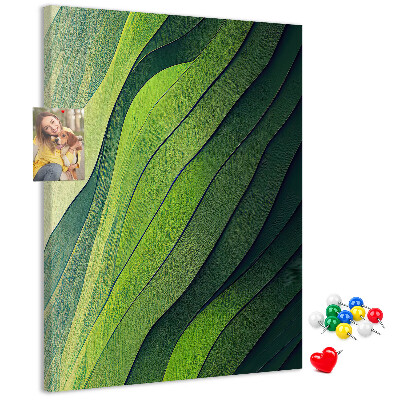 Pizarra de corcho decorativa con diseño de ondas de hojas verdes en tonos sutiles