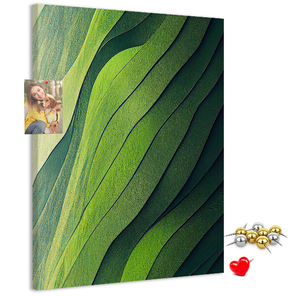 Pizarra de corcho decorativa con diseño de ondas de hojas verdes en tonos sutiles