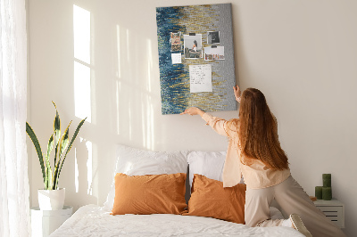 Decoración pizarra de corcho Líneas doradas contra el mar azul