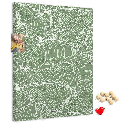 Pizarra de corcho decorativa hojas delicadas sobre fondo verde