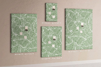 Pizarra de corcho decorativa hojas delicadas sobre fondo verde