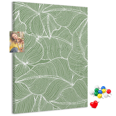 Pizarra de corcho decorativa hojas delicadas sobre fondo verde