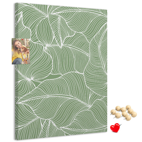 Pizarra de corcho decorativa hojas delicadas sobre fondo verde