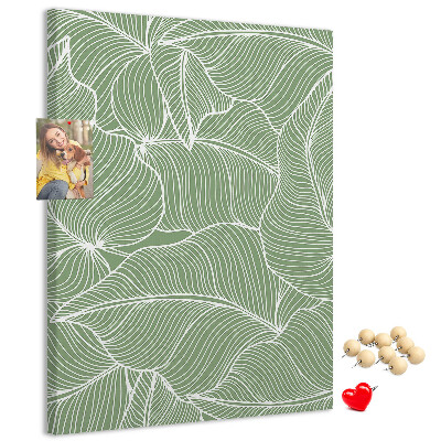 Pizarra de corcho decorativa hojas delicadas sobre fondo verde