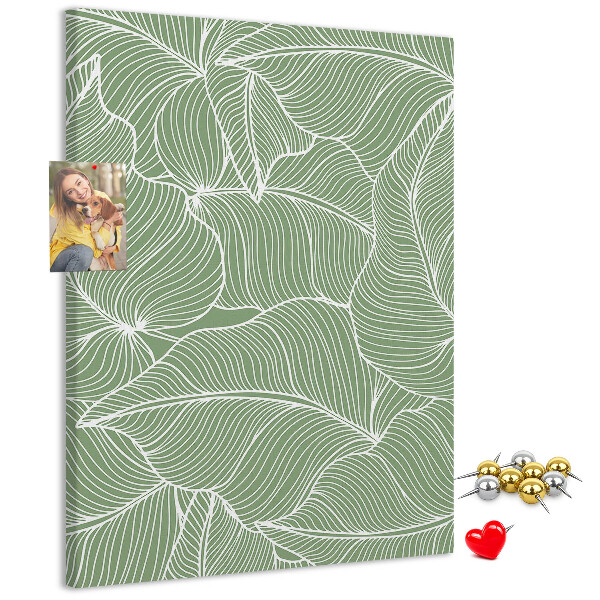 Pizarra de corcho decorativa hojas delicadas sobre fondo verde