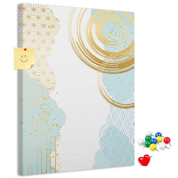 Tablero de corcho para pared con diseño de círculos dorados sobre un fondo delicado