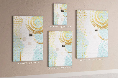 Tablero de corcho para pared con diseño de círculos dorados sobre un fondo delicado