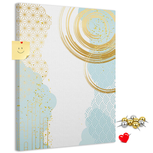 Tablero de corcho para pared con diseño de círculos dorados sobre un fondo delicado