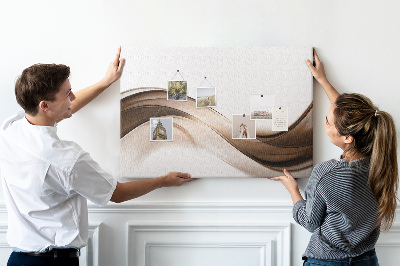 Pizarra de corcho con diseño de ondas en tonos marrones y beige