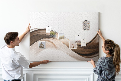 Pizarra de corcho con diseño de ondas en tonos marrones y beige