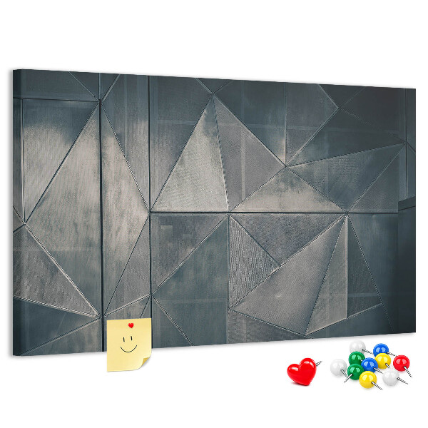 Tablero de anuncios con diseño de formas geométricas en tonos grises