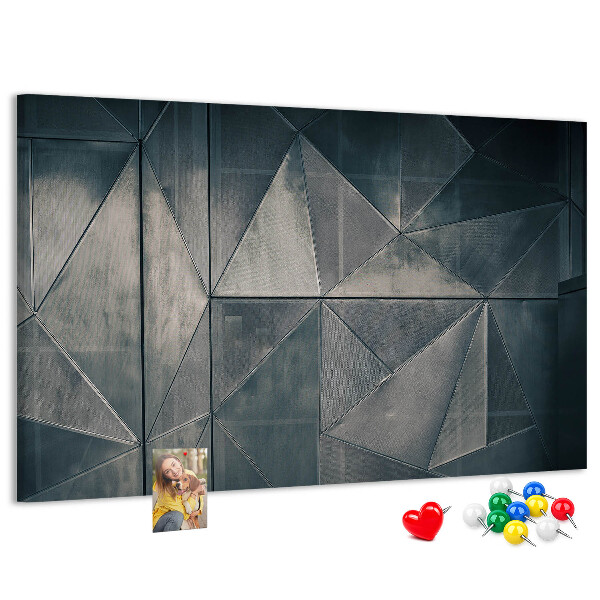 Tablero de anuncios con diseño de formas geométricas en tonos grises
