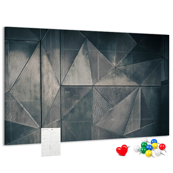 Tablero de anuncios con diseño de formas geométricas en tonos grises