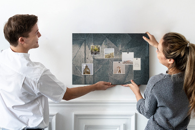 Tablero de anuncios con diseño de formas geométricas en tonos grises