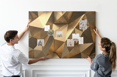 Pizarra de corcho con diseño de formas geométricas en tonos marrones
