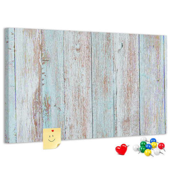 Tablero de corcho decorado Tablas antiguas en tonos azules.