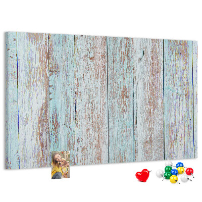 Tablero de corcho decorado Tablas antiguas en tonos azules.
