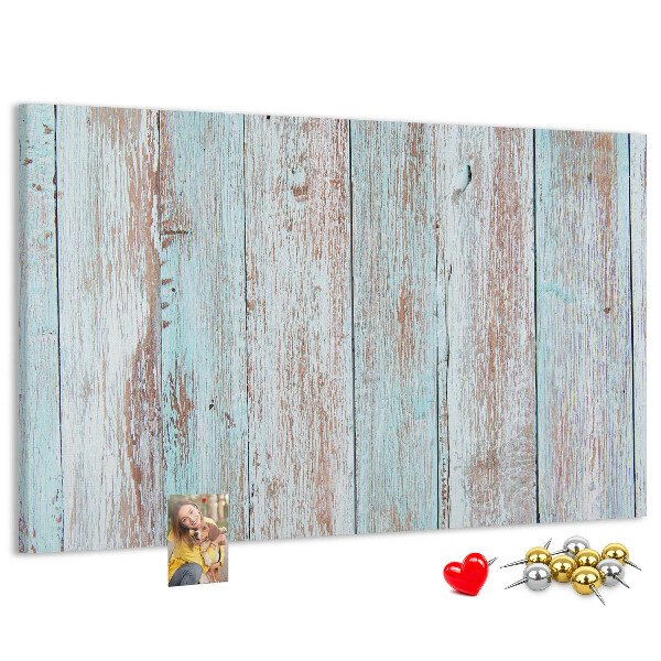 Tablero de corcho decorado Tablas antiguas en tonos azules.