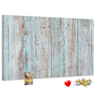 Tablero de corcho decorado Tablas antiguas en tonos azules.