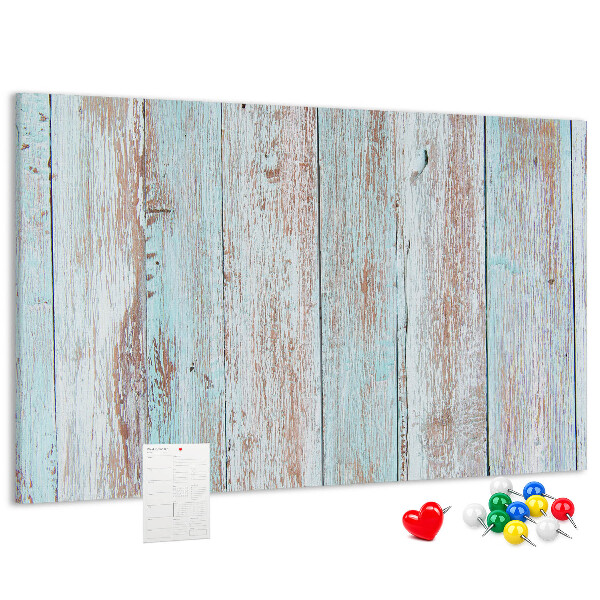 Tablero de corcho decorado Tablas antiguas en tonos azules.