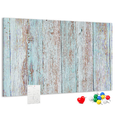 Tablero de corcho decorado Tablas antiguas en tonos azules.