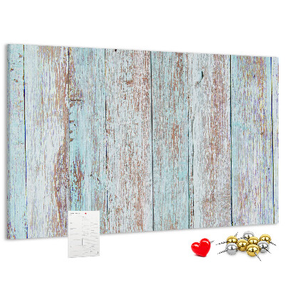 Tablero de corcho decorado Tablas antiguas en tonos azules.
