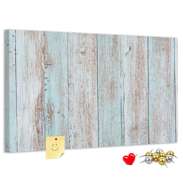 Tablero de corcho decorado Tablas antiguas en tonos azules.