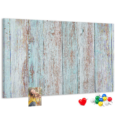 Tablero de corcho decorado Tablas antiguas en tonos azules.