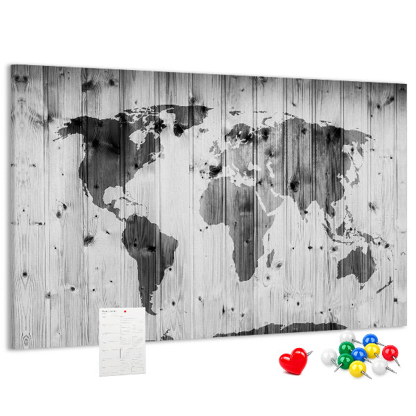 Tablero de anuncios Un mapamundi sobre un fondo de tablas de madera.