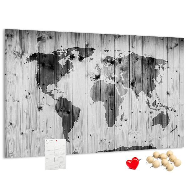 Tablero de anuncios Un mapamundi sobre un fondo de tablas de madera.