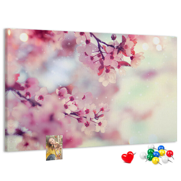Pizarra de corcho con diseño de ramas florales en tonos pastel