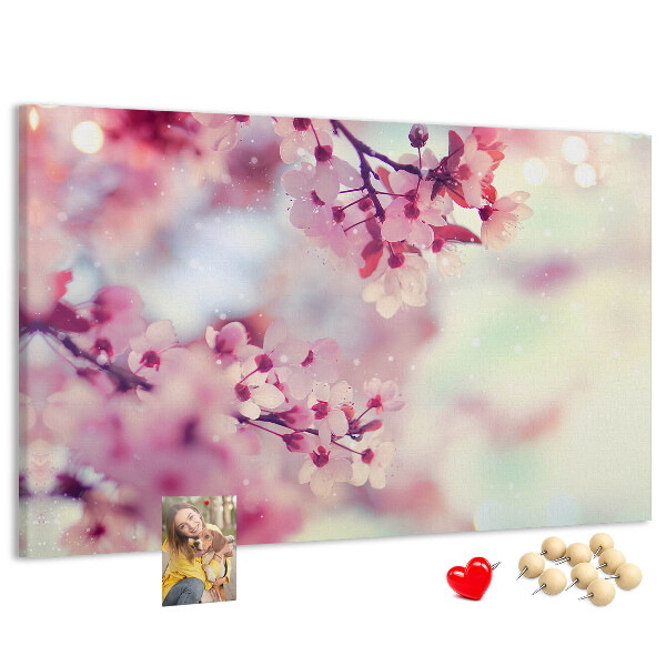 Pizarra de corcho con diseño de ramas florales en tonos pastel