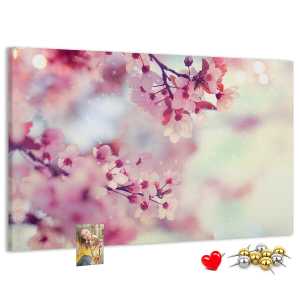 Pizarra de corcho con diseño de ramas florales en tonos pastel